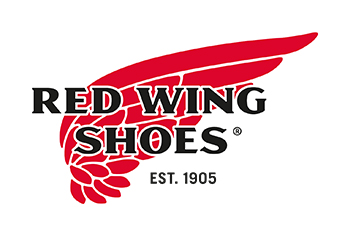Klassisches Logo von Red Wing Shoes, kombiniert aus Schriftzug und Flügel-Symbol